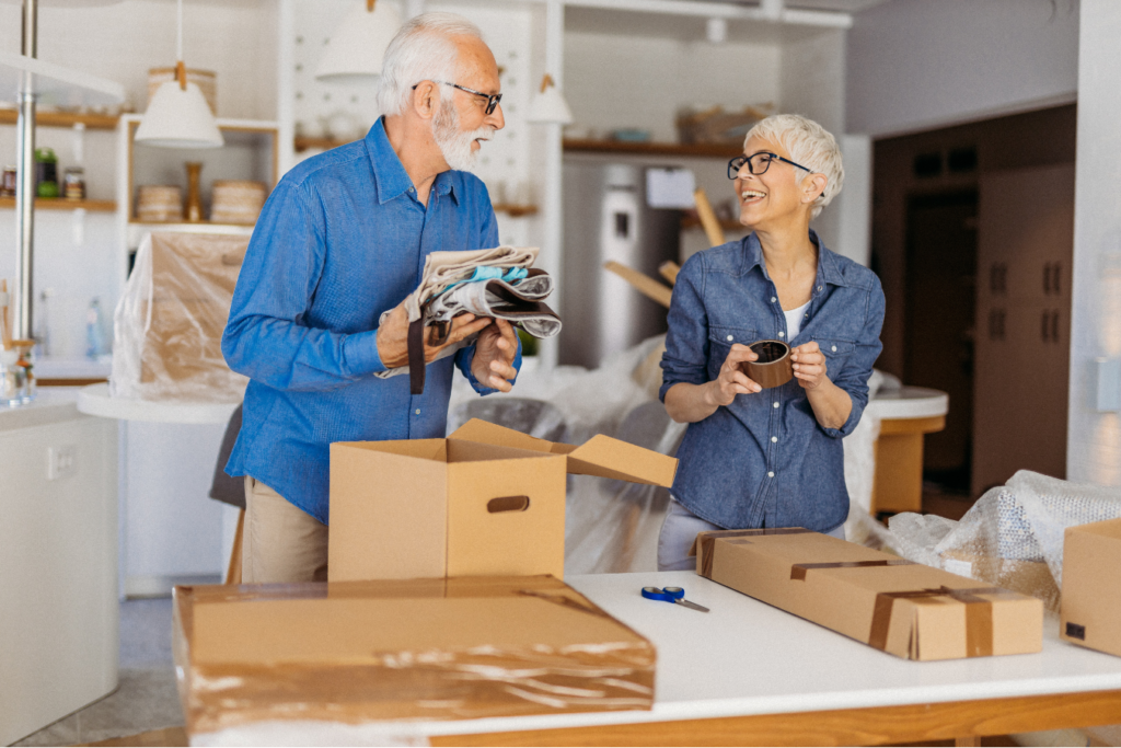 Senior Elderly Couple Moving Packing